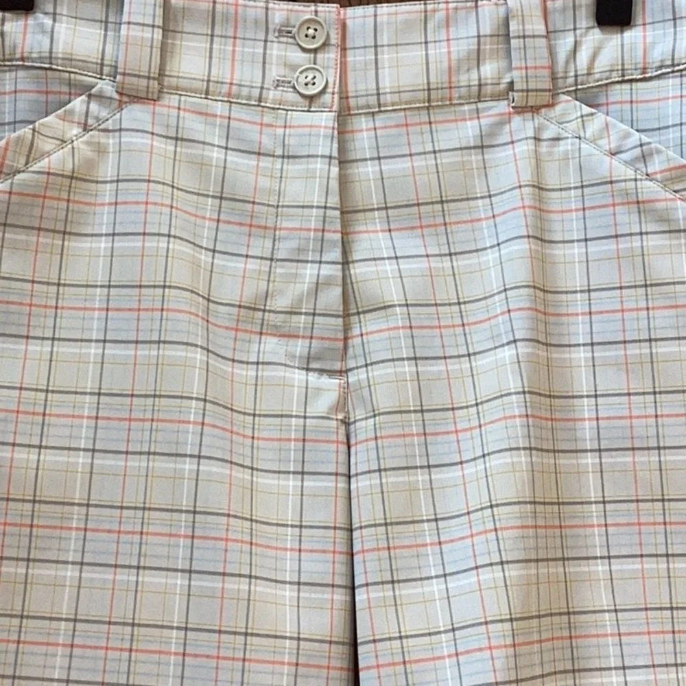 Nike Dri-Fit plaid gold shorts. Women’s size 4